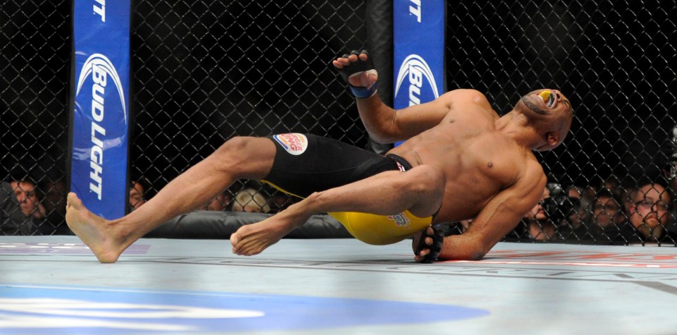  Anderson Silva of Brazil screams in pain after kicking Chris Weidman in 2013