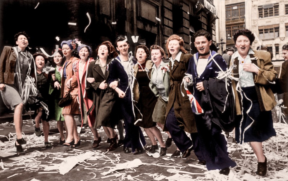 People dancing in the streets of London during the celebrations for VE Day