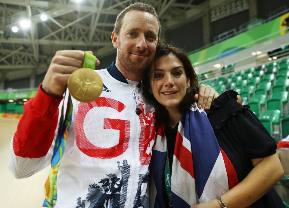 Bradley Wiggins of Team GB and wife Catherine pose for photographs after he won gold at the Rio 2016 Olympic Games