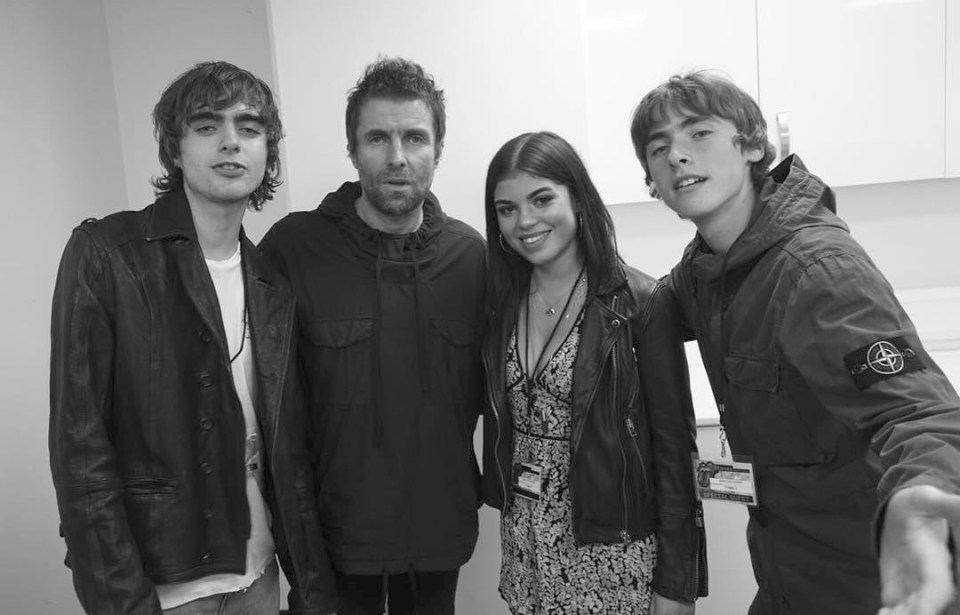  The rocker pictured with three of his children; Lennon, 20, Molly, 22, and Gene, 18