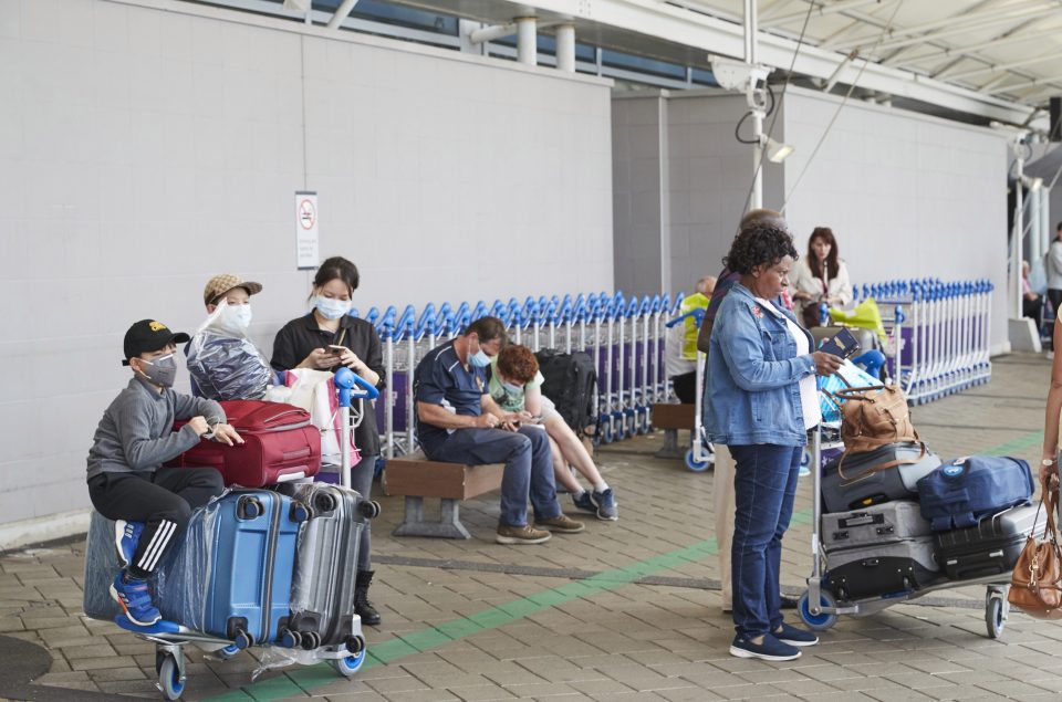  Passengers pictured at Wellington Airport in February, before the outbreak