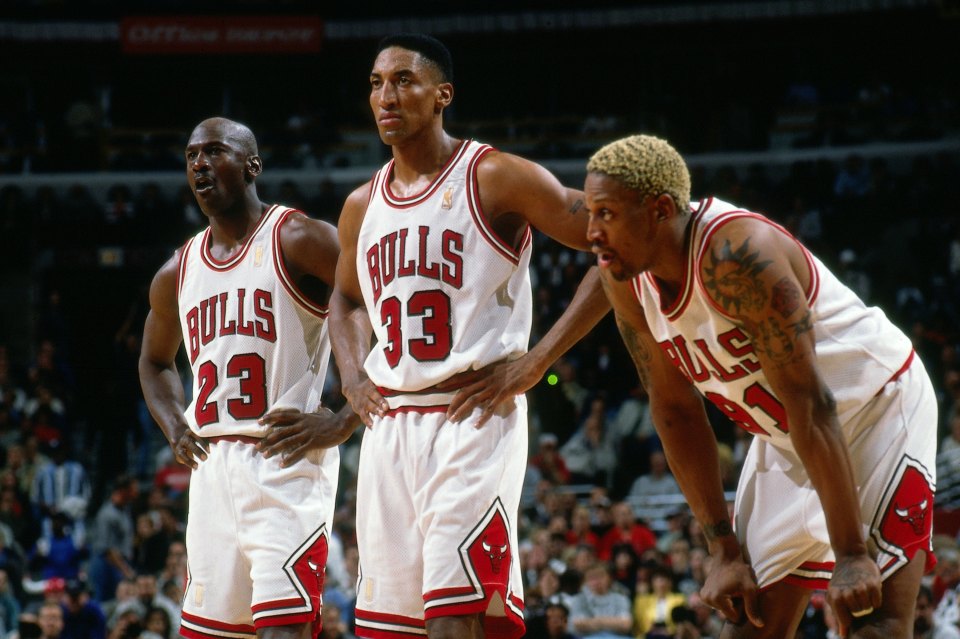  Rodman was a key member of the Chicago Bulls championship-winning team alongside Michael Jordan (left) and Scottie Pippen (middle)