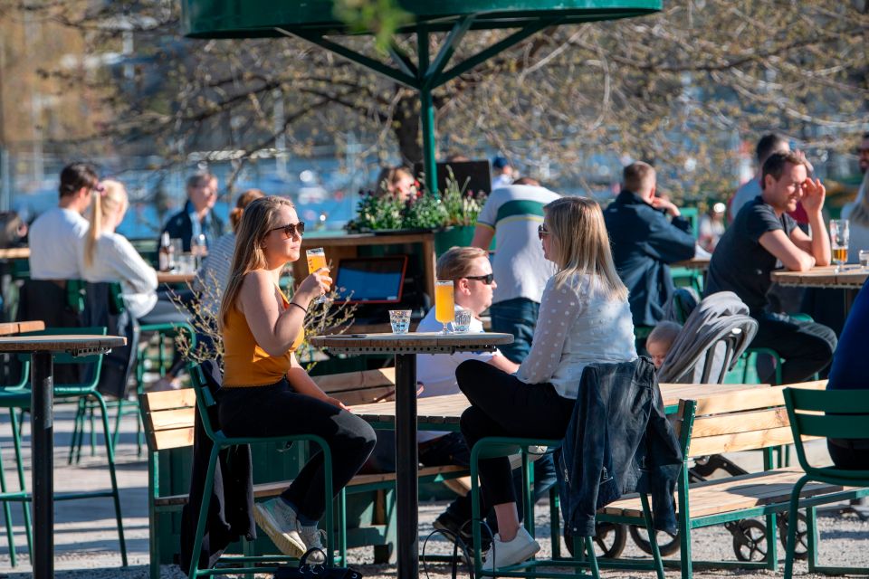  People have been seen sipping drinks in the sunshine in Stockholm