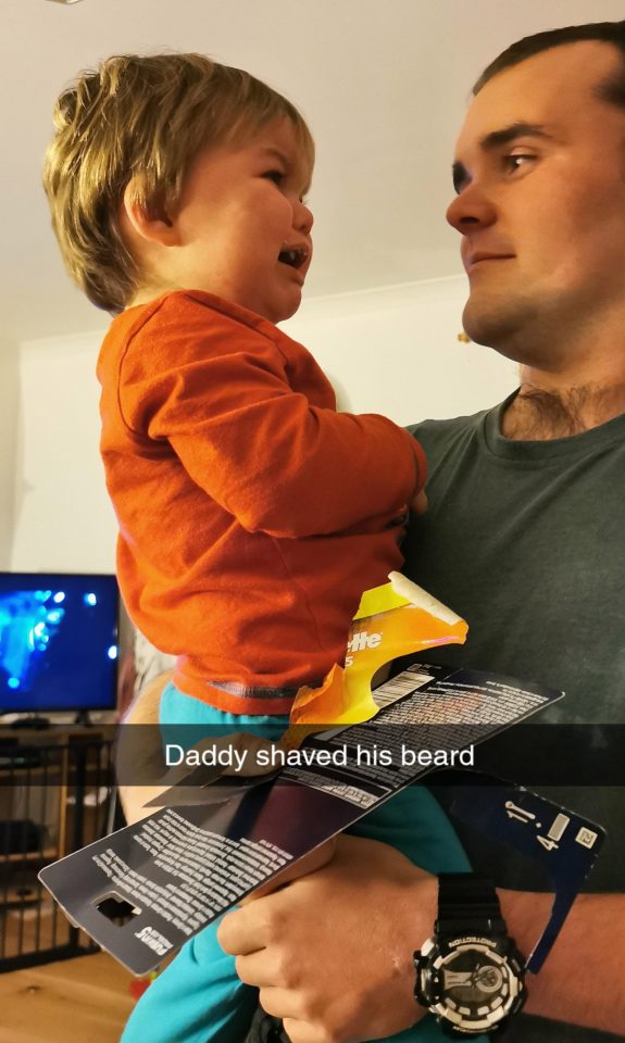  The toddler was beside himself when his dad David shaved his beard