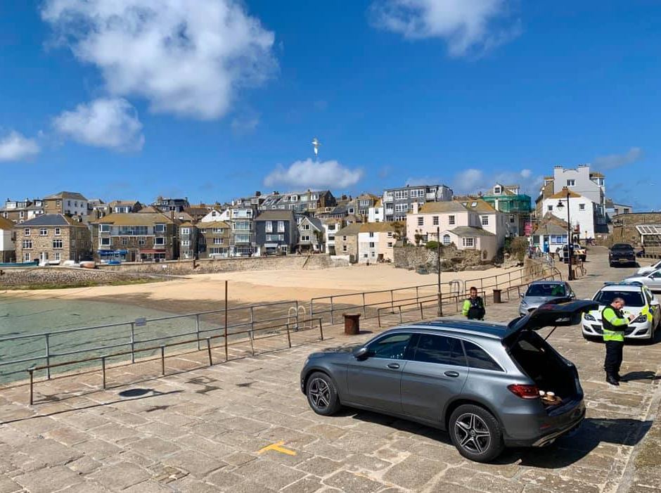  Cops fined the couple after they travelled from Surrey to St Ives in Cornwall