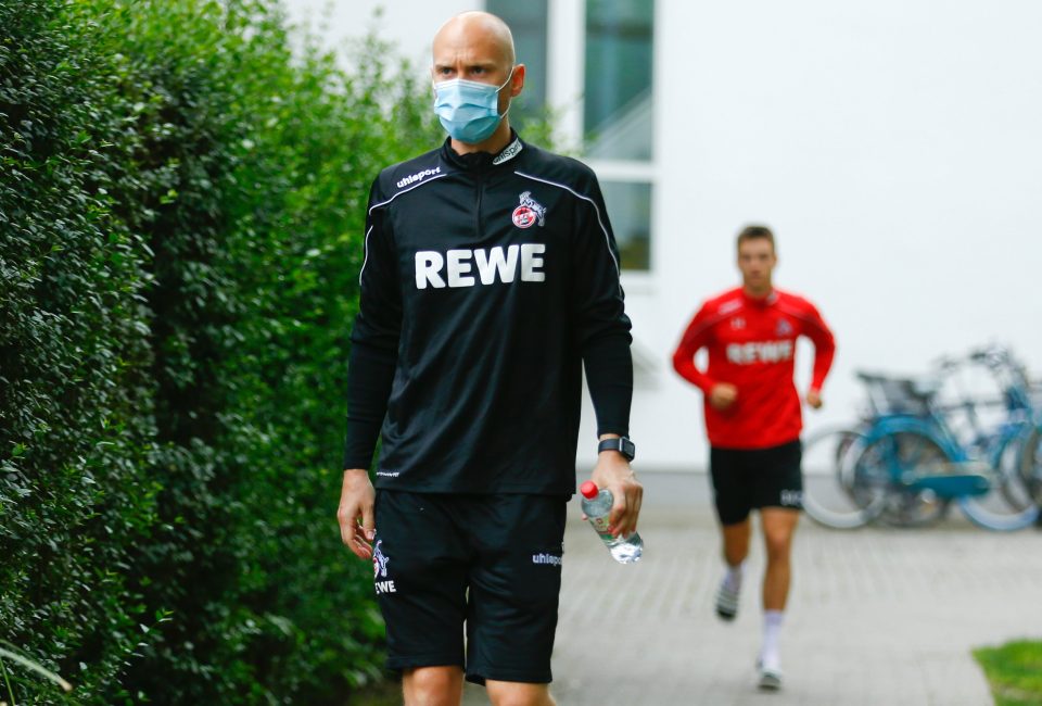  FC Cologne staff don PPE as the German Bundesliga returned to action, with the Premier League soon following suit