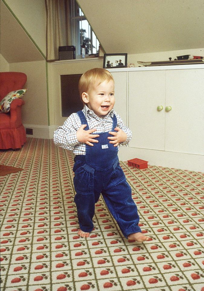 The youngster shares the same cheeky grin as one-year-old Harry back in 1985