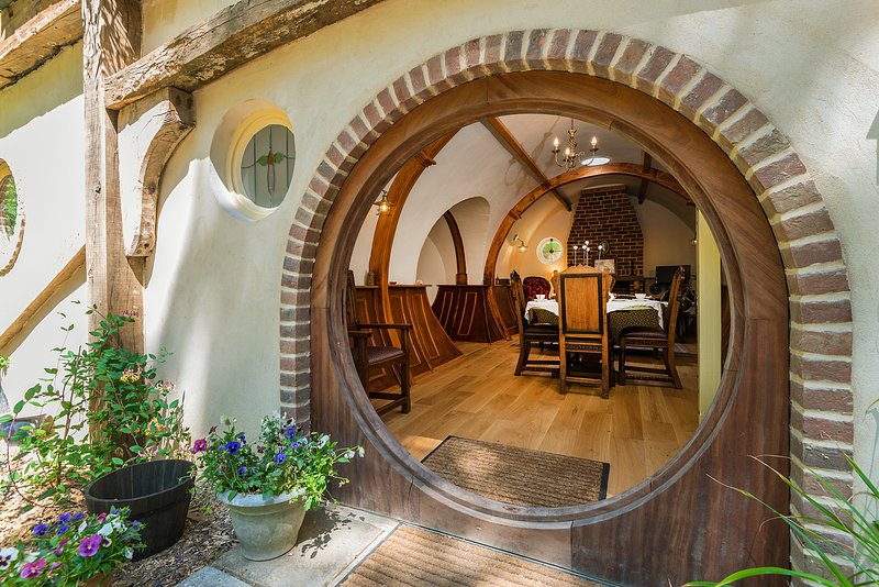 The home has an earthen roof, circular walls and doors and no 90-degree angles