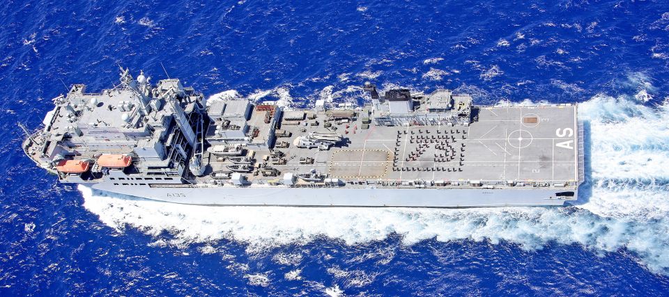  Sailors, soldiers and Royal Marines aboard support ship RFA Argus patrolling the Caribbean spell out 75 on the flight deck to mark the 75th anniversary of VE Day