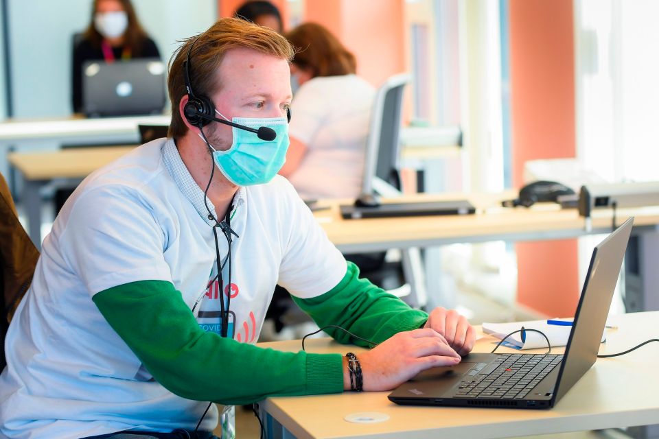  A contact tracer working in a call centre in Brussels, Belgium