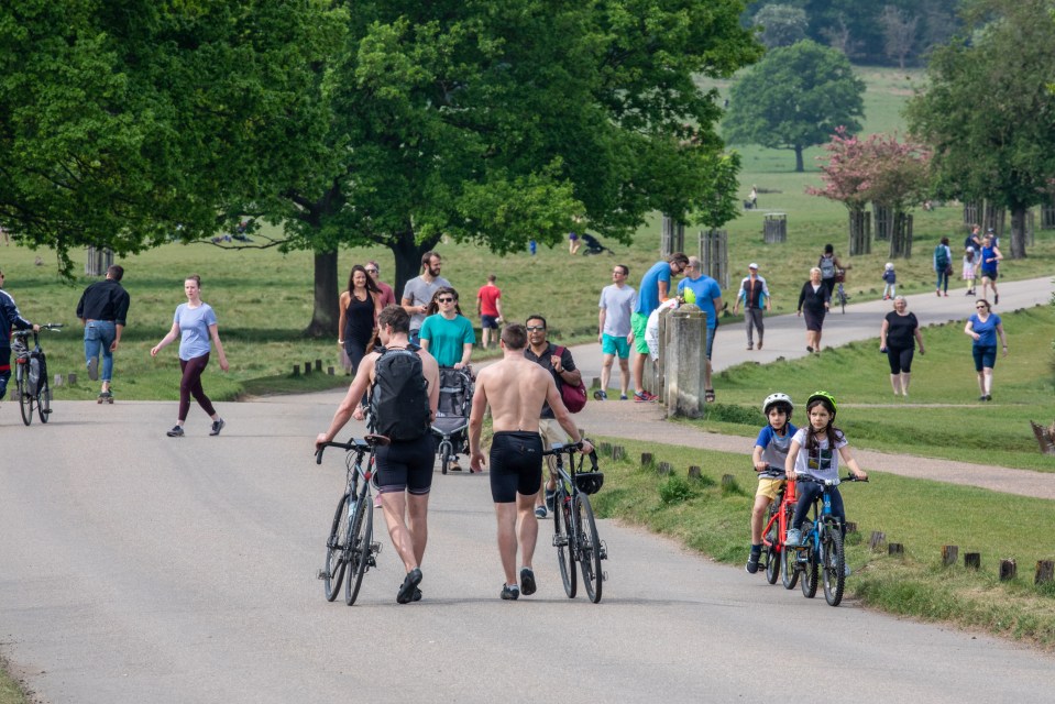  Members of the public flock to Richmond Park in South West London as temperatures are set to hit 25C this weekend