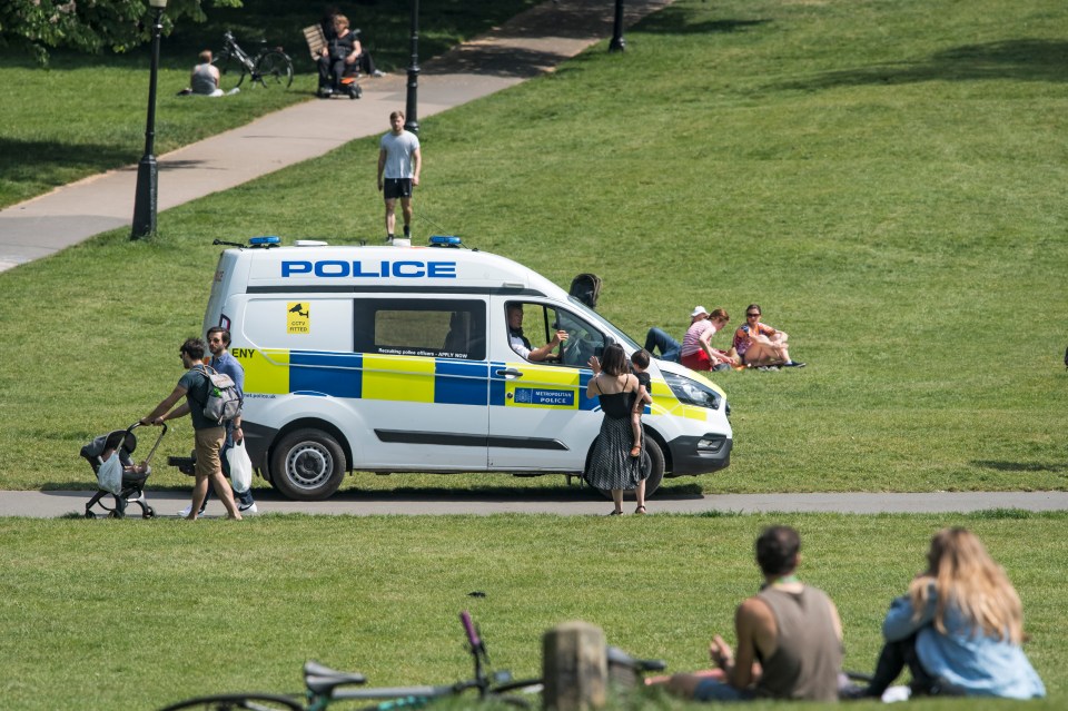  Police patrol in a vehicle through Primrose Hill today