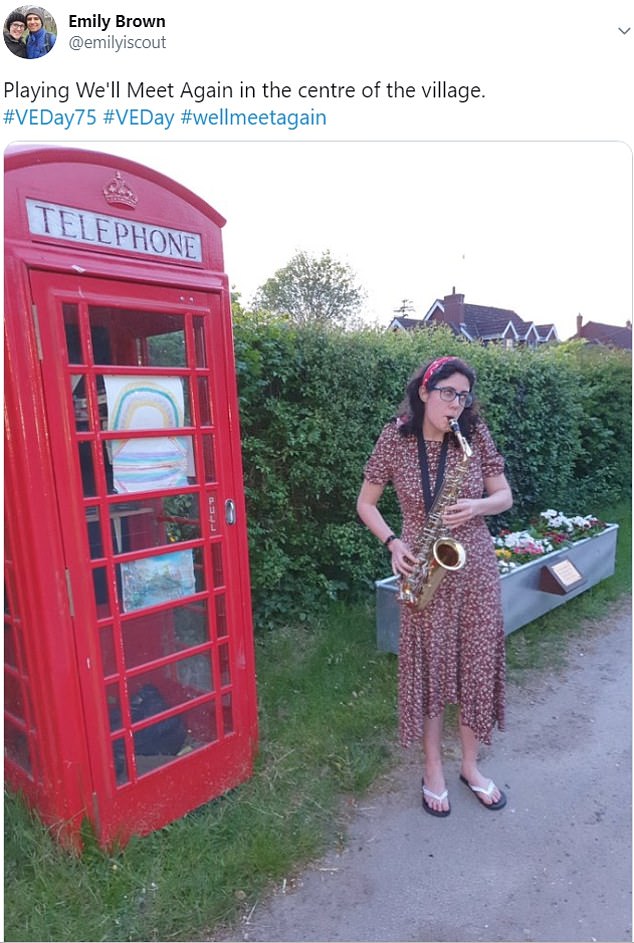  A woman joins the singalong by playing the sax