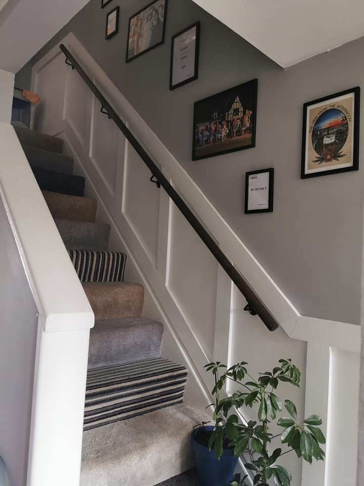 This wood panelling instantly makes the stairs look stylish and modern