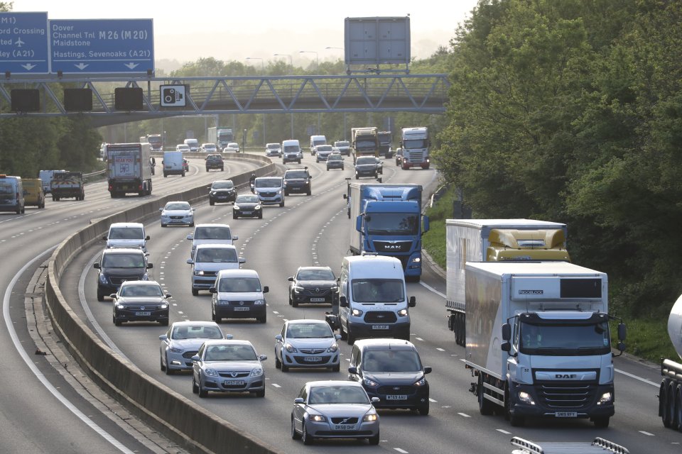  Cars pictured on the M25 in Kent during rush hour this morning following Boris Johnson's coronavirus speech