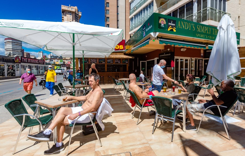  People soak up the sun and enjoy a pint after nearly two months of lockdown