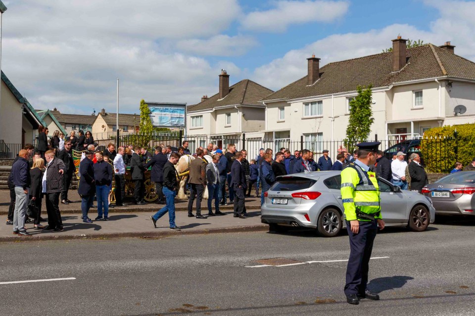  Officers of An Garda Siochana were in the vicinity of the church, directing traffic and watching over proceedings