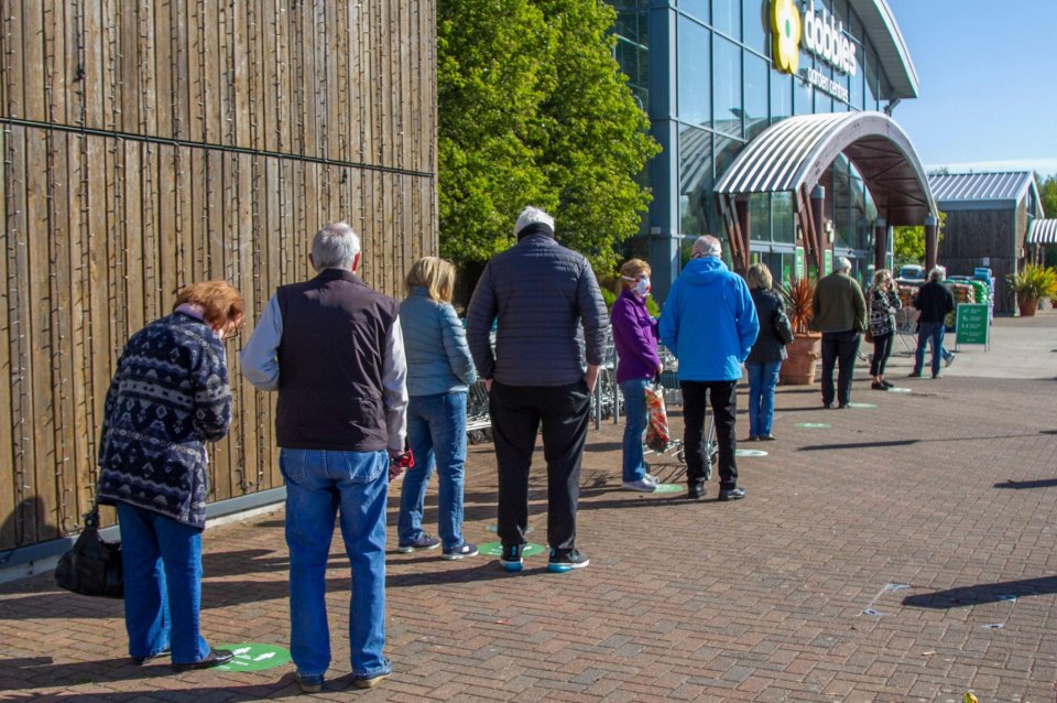  Long queues have formed at garden centres after they reopened today