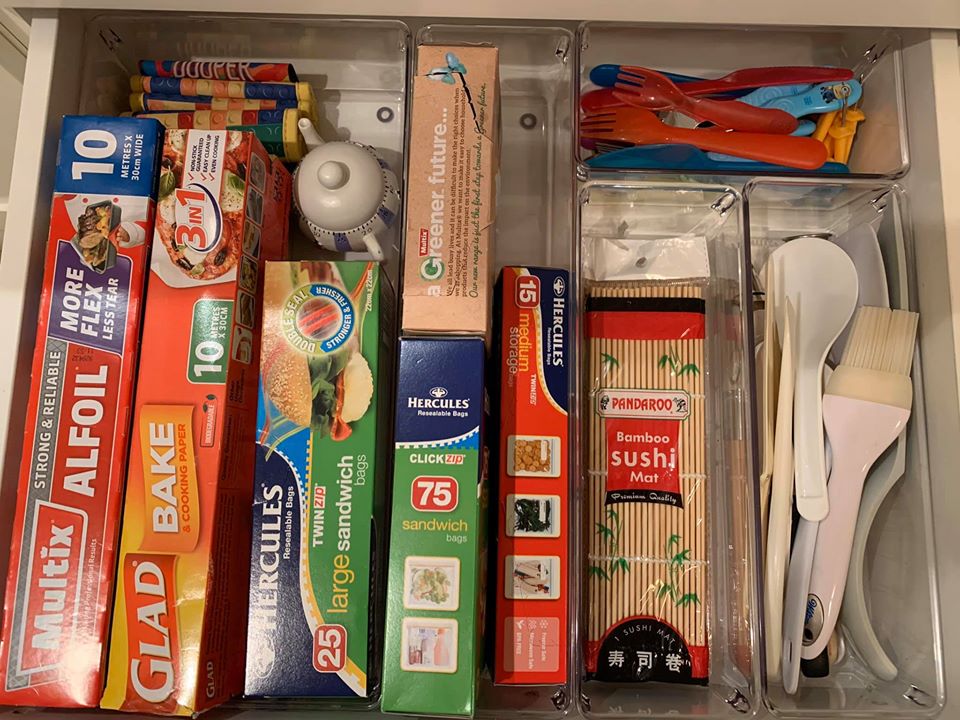 Drawers feature boxes of foil and cling film that are lined up in rows