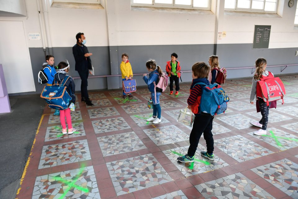  Social distancing is the new norm for kids back at school in France after the easing of lockdown restrictions