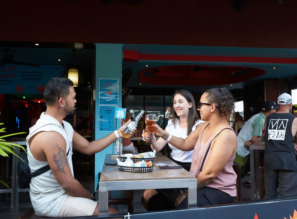  People eat and drink at a bar in Darwin, Australia, as restrictions were eased on May 15