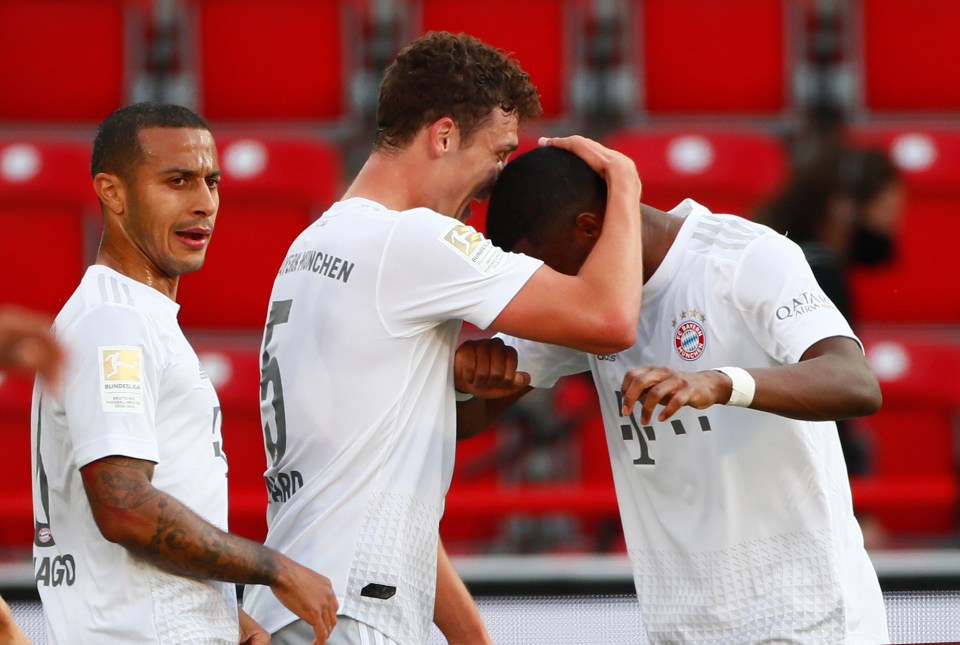  Pavard celebrates with Alaba after scoring Bayern's second