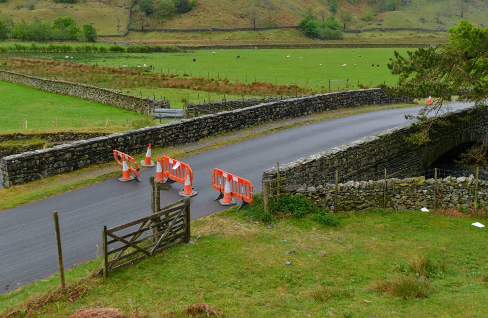  Makeshift barriers block roads into Seathwaite in Borrowdale valley