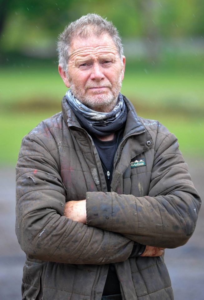  Farmer Peter, 65, used plastic barriers to create an unofficial roadblock to deter hikers