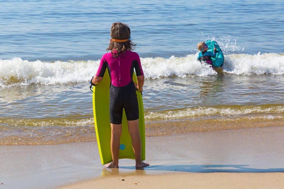  Kids enjoy the hot weather on the beach in Poole, Dorset