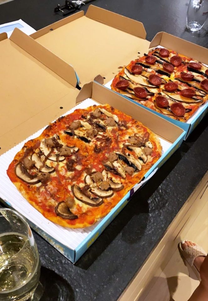  They celebrated their first night in the home with monster pizzas