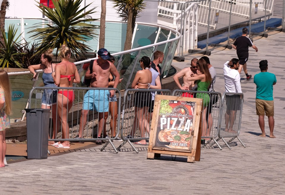  Queues were seen outside one bar in Bournemouth selling takeaway booze