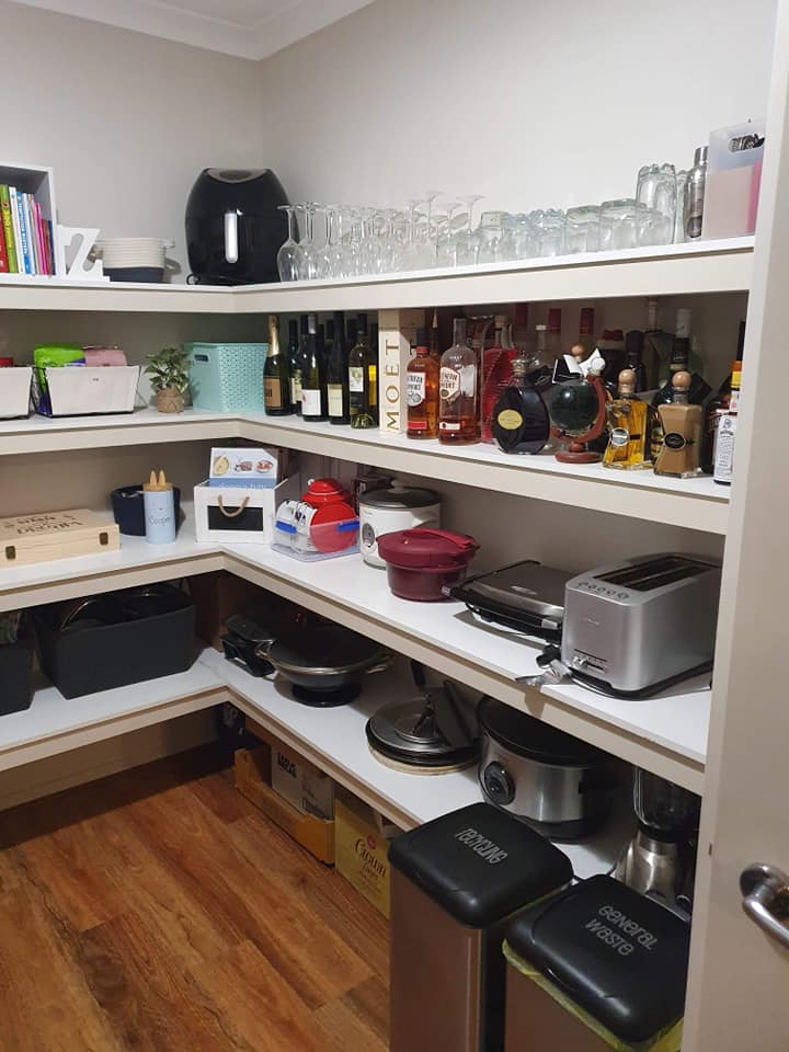 One side of the pantry is made up up a mini bar, and store every kitchen appliance you could ever need 