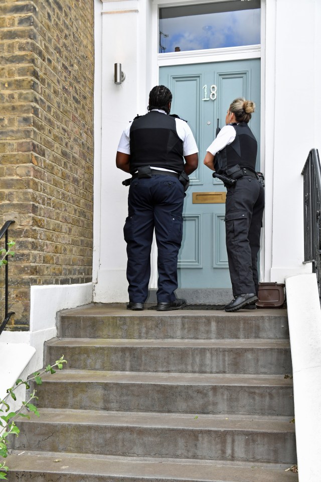  Police officers arrive at Dominic Cummings' Islington home on Sunday