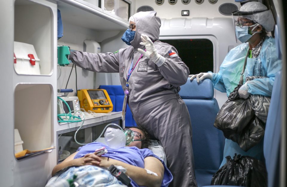  Medics in Manaus, now the epicentre of the country's outbreak, treat a patient