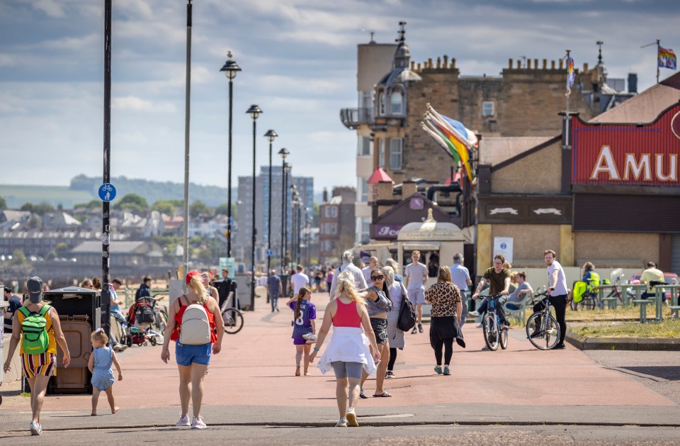  The promenade at Portobello, Scotland, was busy again yesterday as weather continues to delight