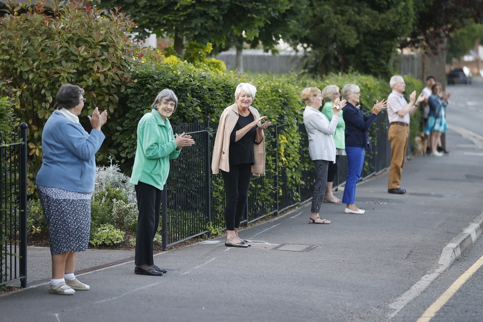 Residents lined up safely to clap and applaud the key workers