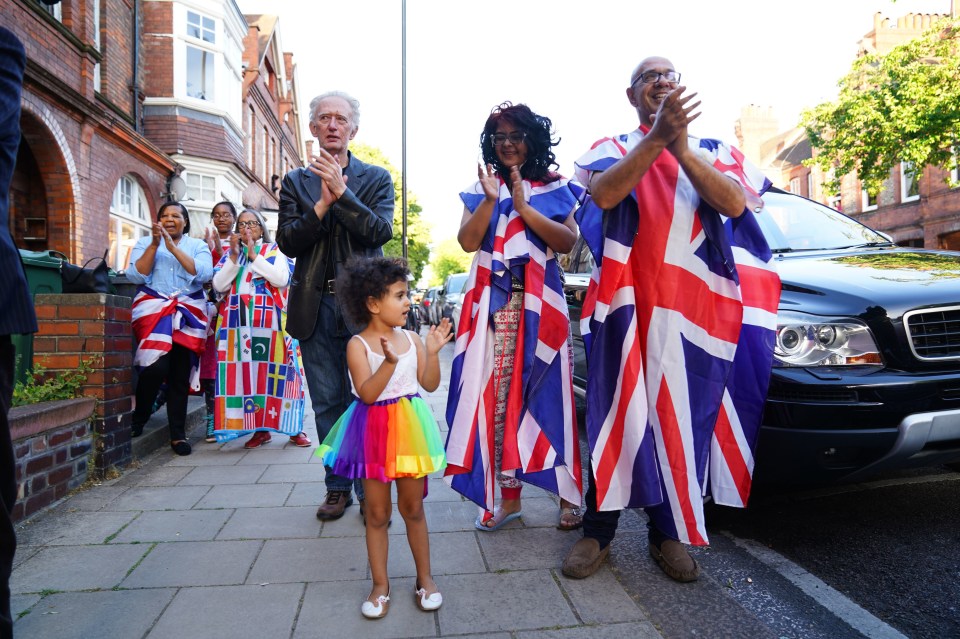 Neighbours of the Clap for Carers founder joined in while wearing colourful patriotic outfits