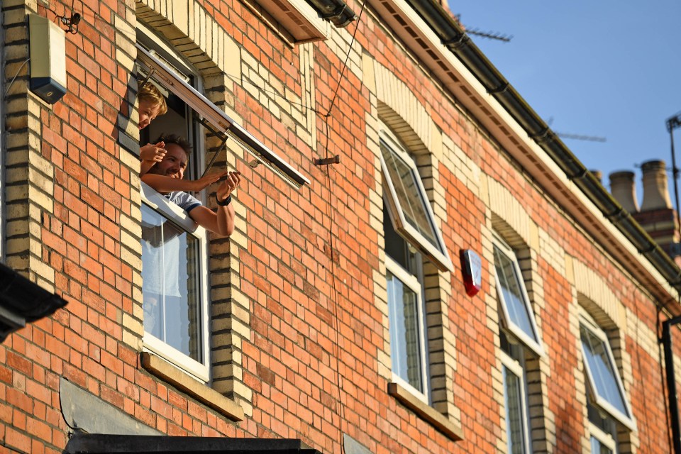 Brits cheered from windows and front doors this evening as they applauded key workers