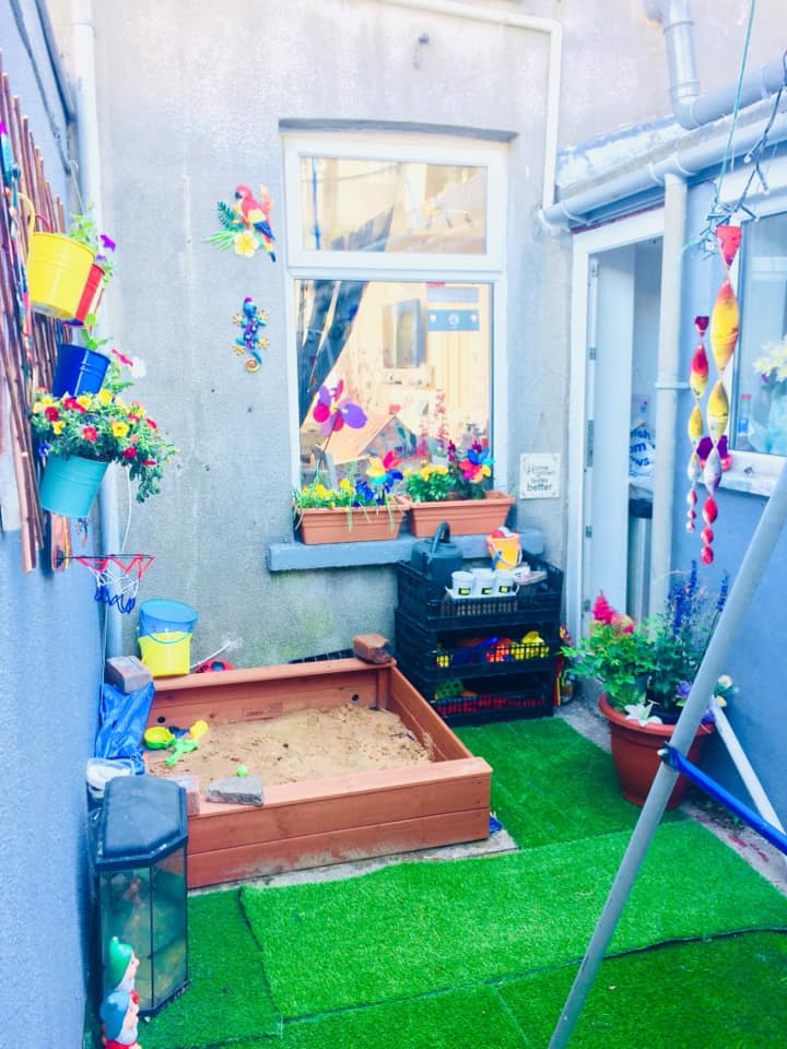 The mum turned the tiny yard outside the kitchen into a colourful oasis 