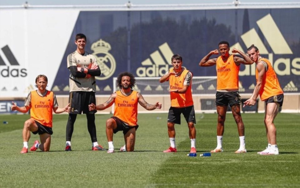 Gareth Bale, far right, pulled off this golf pose during training