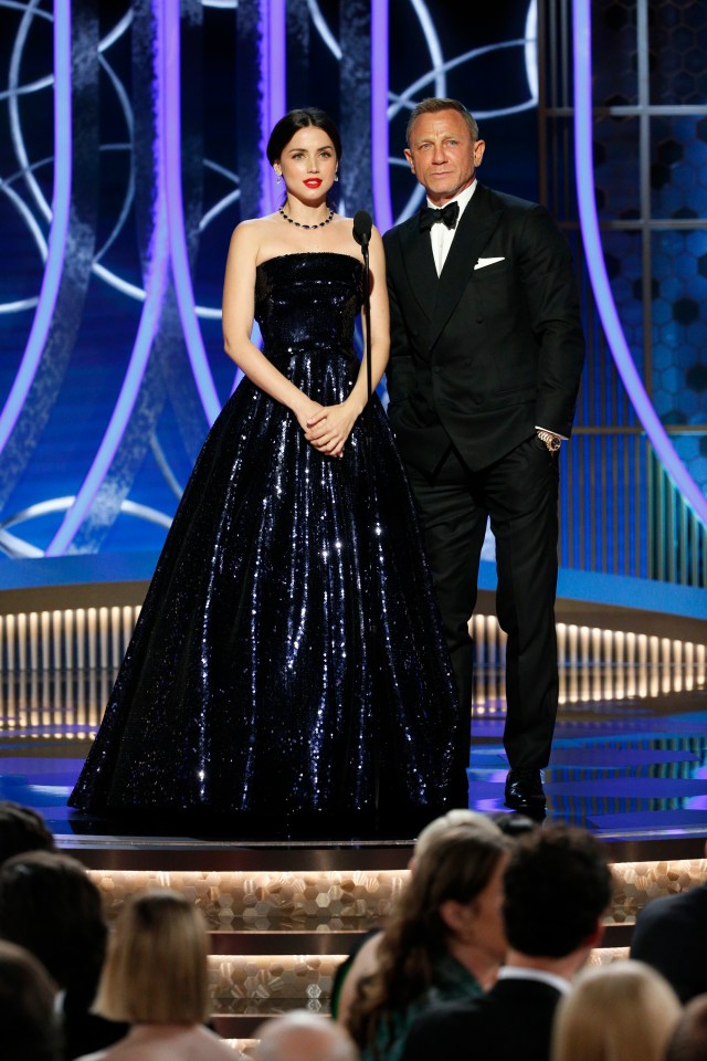 Ana de Armas and Daniel Craig onstage during the 77th Annual Golden Globe Awards