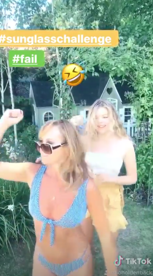  Amanda Holden strips down to a bikini as she dances with lookalike daughter