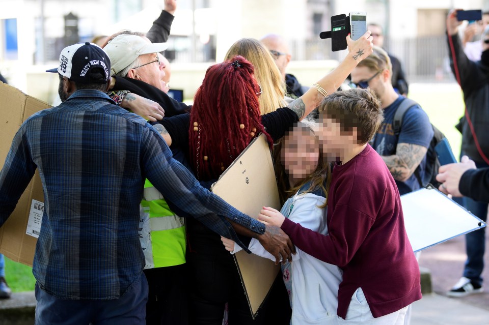  Kids joined the group hug during the protest