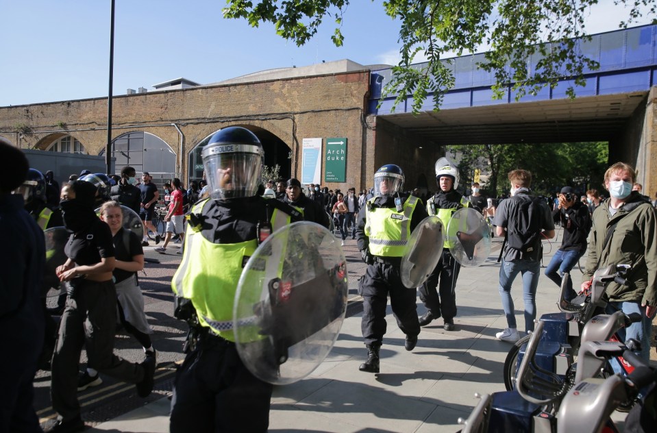 Riot cops raced to try and stop groups clashing at Waterloo Station