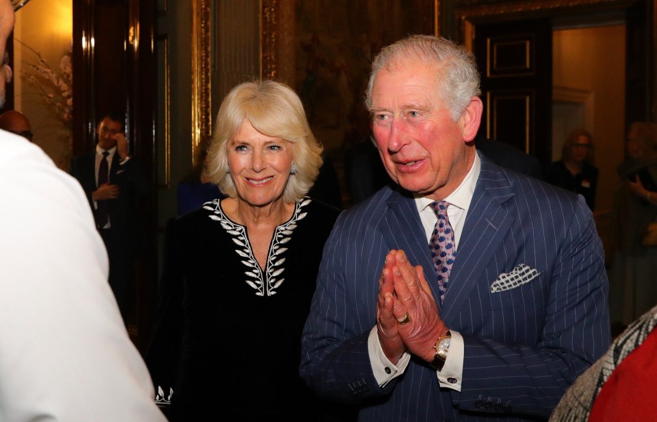 Prince Charles greets guests with the namaste gesture at the Commonwealth Day Reception in March