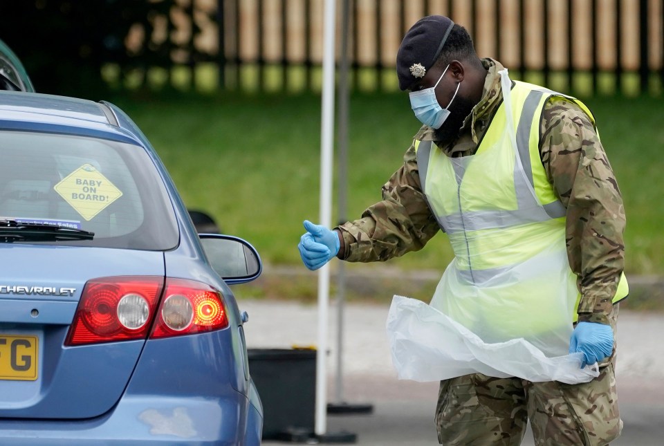 A soldier from the Royal Logistics Corp at a mobile coronavirus testing site at Evington Leisure Centre