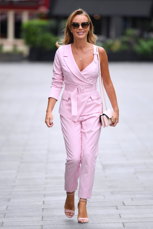 Amanda Holden looked pretty in pink while heading to host her Heart Radio show