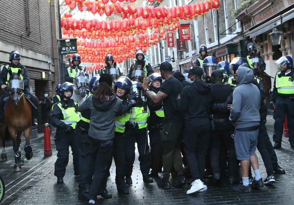 Police tried to stop the two groups meeting and clashing