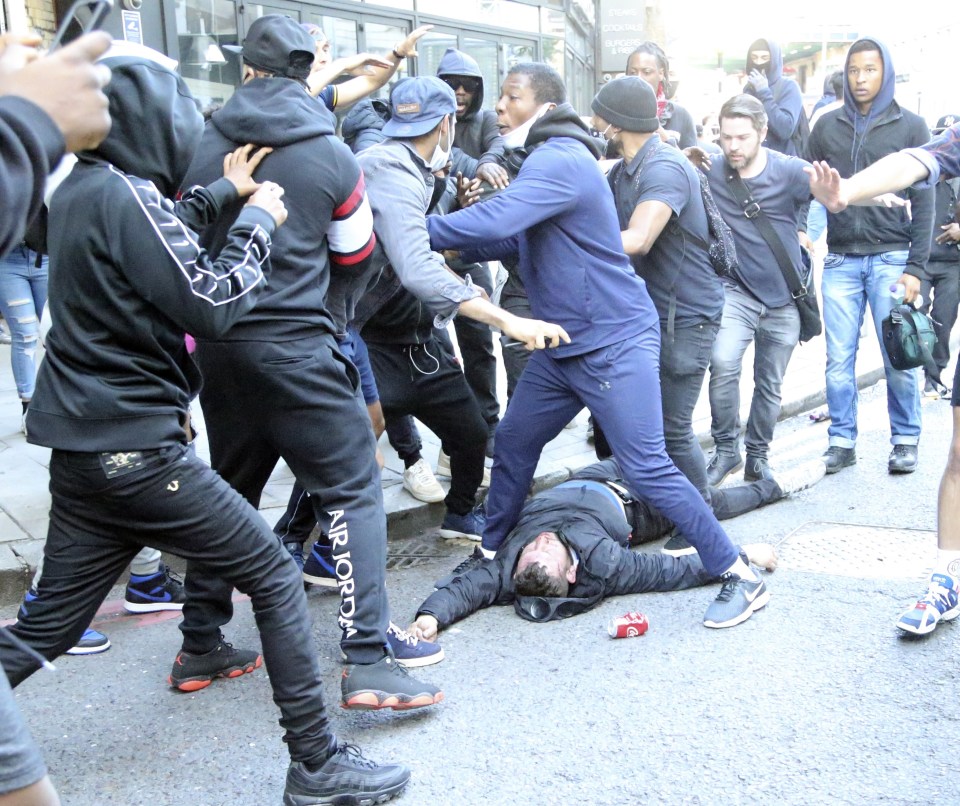 While many were visiting parks and beaches to enjoy the sunshine, violence broke out in central London