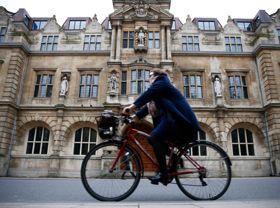 The statue stands above the entrance to Oxford University's Oriel College